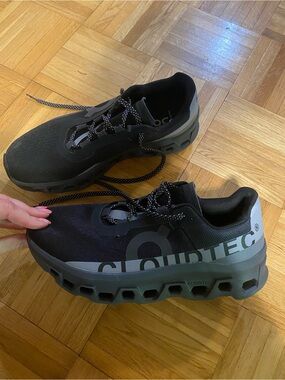 On Running Black Low-Top Cloudmonster Sneakers with Reflective Accents
